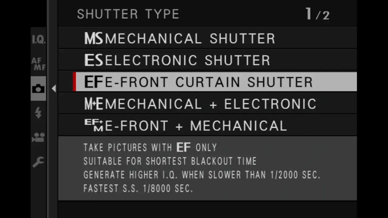 Menu aparatu z opcjami migawki. Wybrana opcja to "EF E-FRONT CURTAIN SHUTTER", która zapewnia najlepszą jakość obrazu (I.Q.) przy krótkich czasach naświetlania.